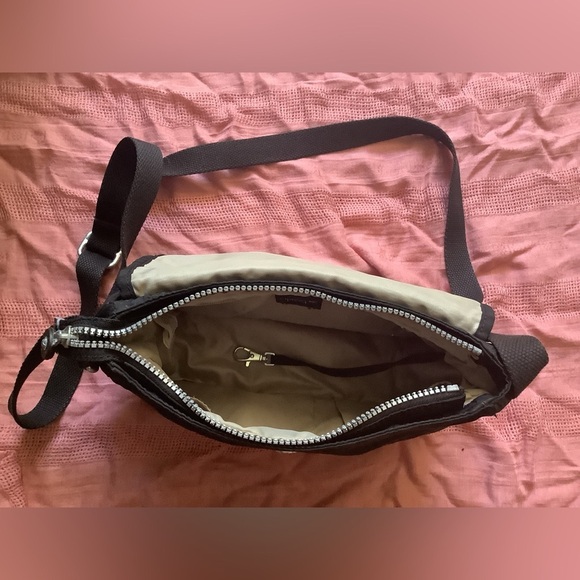 Kipling cross-body bag in black. - Picture 2 of 3